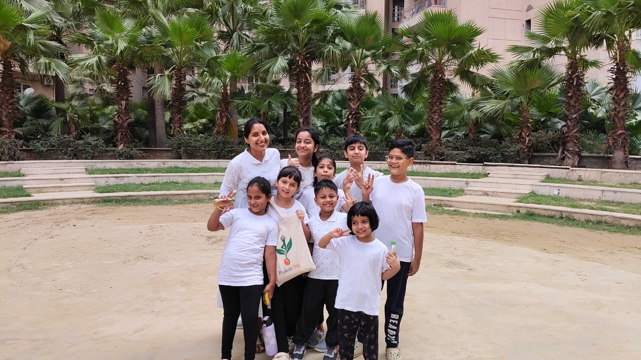 Kids enjoying yoga movement and play at Prakriti Yog Studio